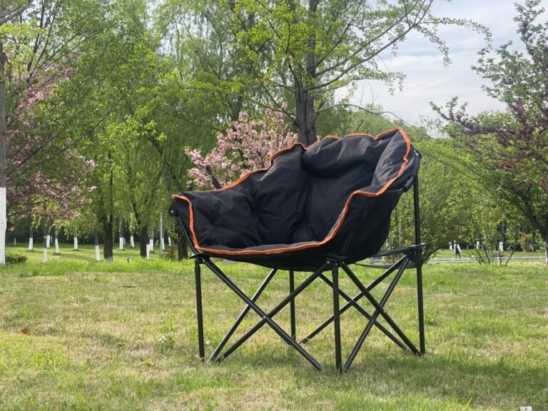 Wholesale padded moon chair, thickened folding camping chair with orange trim