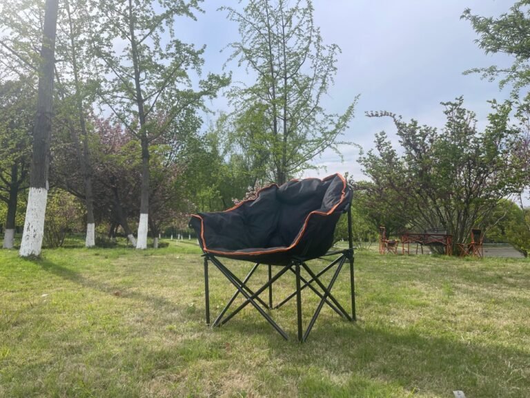 Wholesale padded moon chair, thickened folding camping chair with orange trim