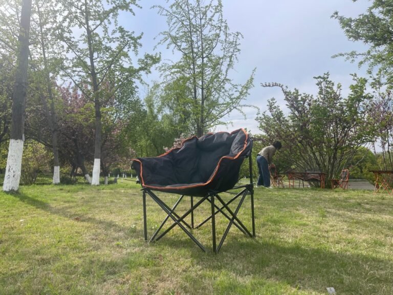 Wholesale padded moon chair, thickened folding camping chair with orange trim