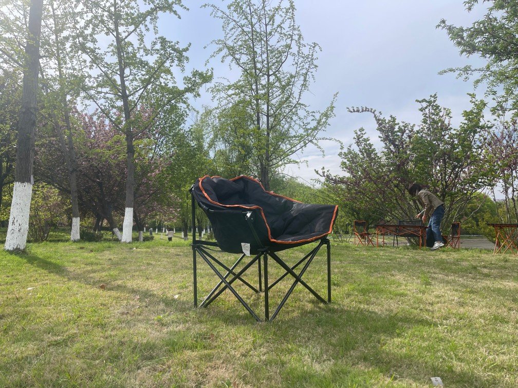 Wholesale padded moon chair, thickened folding camping chair with orange trim