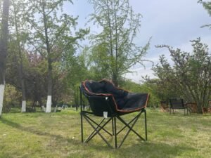 Wholesale padded moon chair, thickened folding camping chair with orange trim