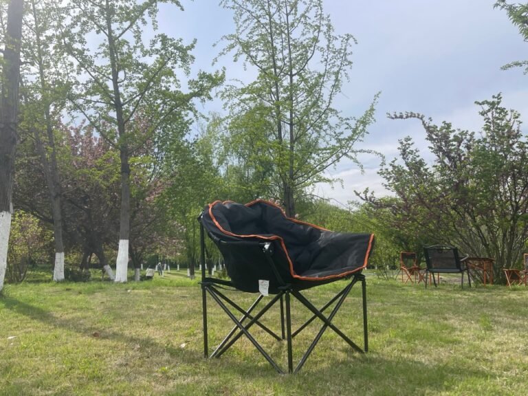 Wholesale padded moon chair, thickened folding camping chair with orange trim